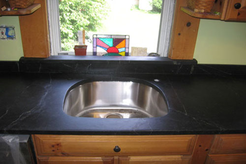 Comparison of a Soapstone sink with a stainless steel