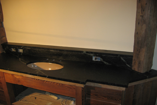Comparison of soapstone and porcelain vanity sinks