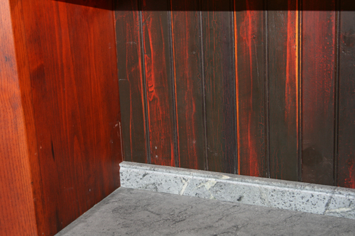 A wood beadbord backsplash compared to a stone beadboard backsplash
